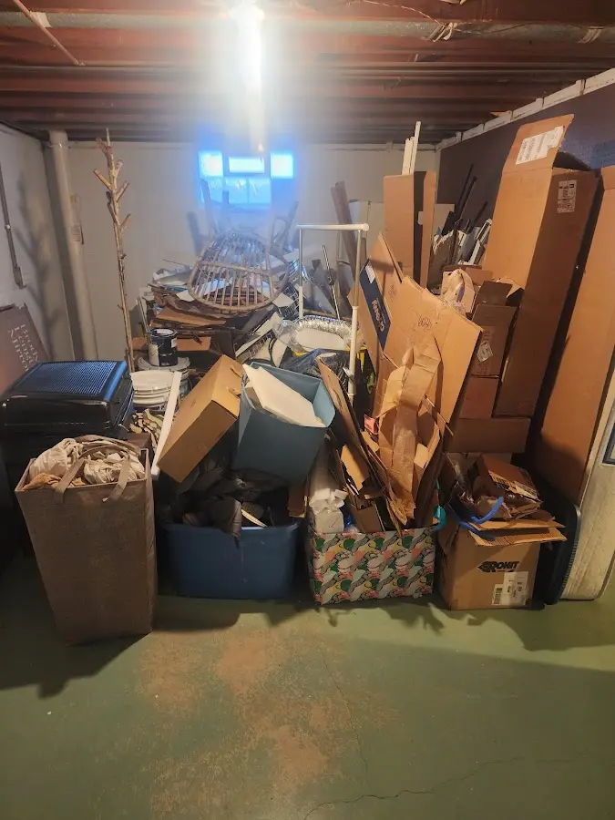 Roll-off dumpster container at job site for Concrete Dumpster Rental in Medford